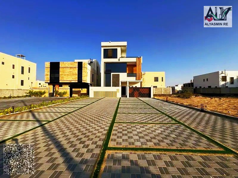 Own a villa on Sheikh Mohammed Bin Zayed Road, with a 30-meter frontage, ground floor, first floor, and roof. Registration fees included. Freehold own
