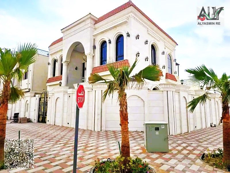 Own a miniature corner palace on two streets, surrounded by all services, including registration and ownership fees, on Sheikh Mohammed Bin Zayed Road