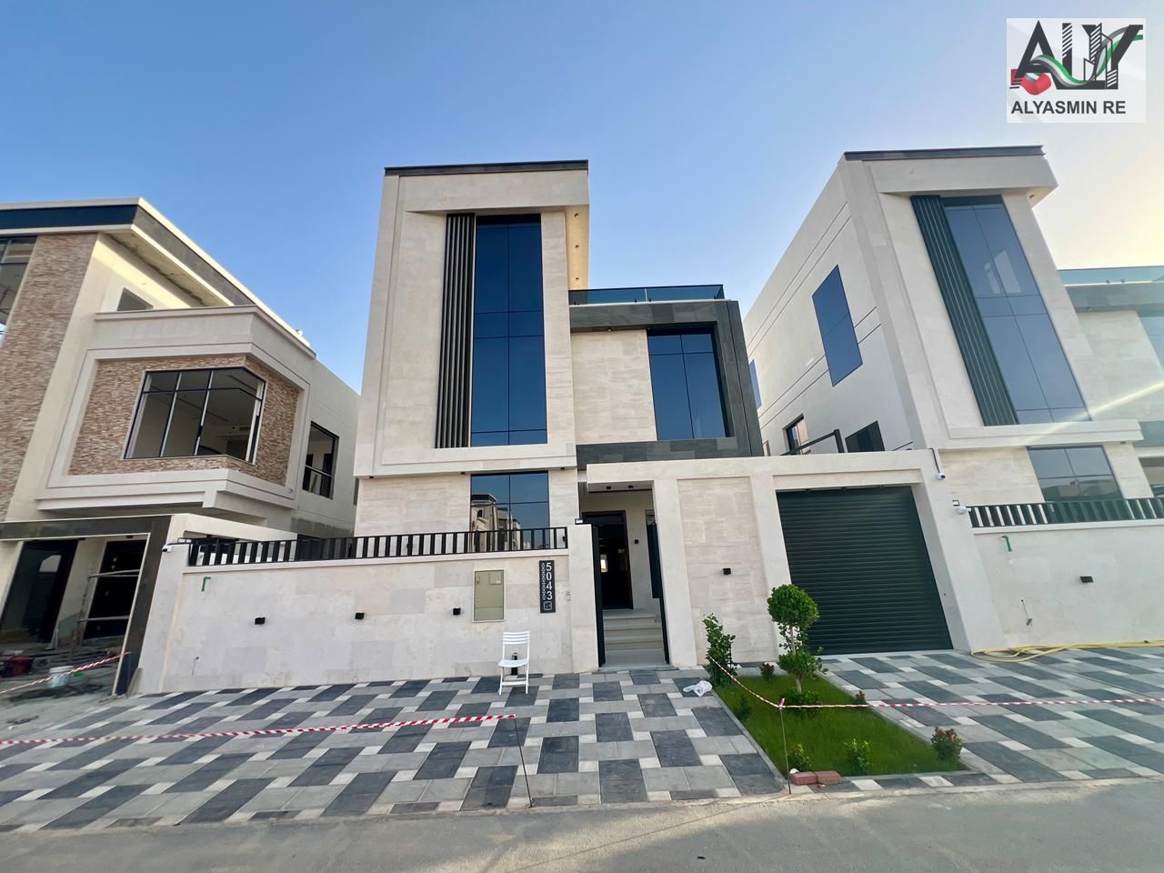 Seize your opportunity. . . Your dream villa with exquisite details, 3 floors, and an elegant stone facade.