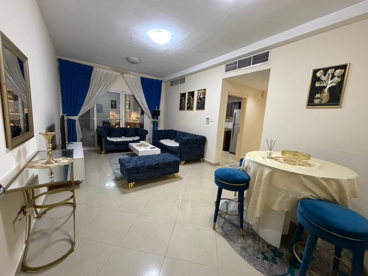 Furnished one-bedroom apartment with living room in Al Taawun, 2 bathrooms, prime location near services, fully equipped, available for monthly rent,