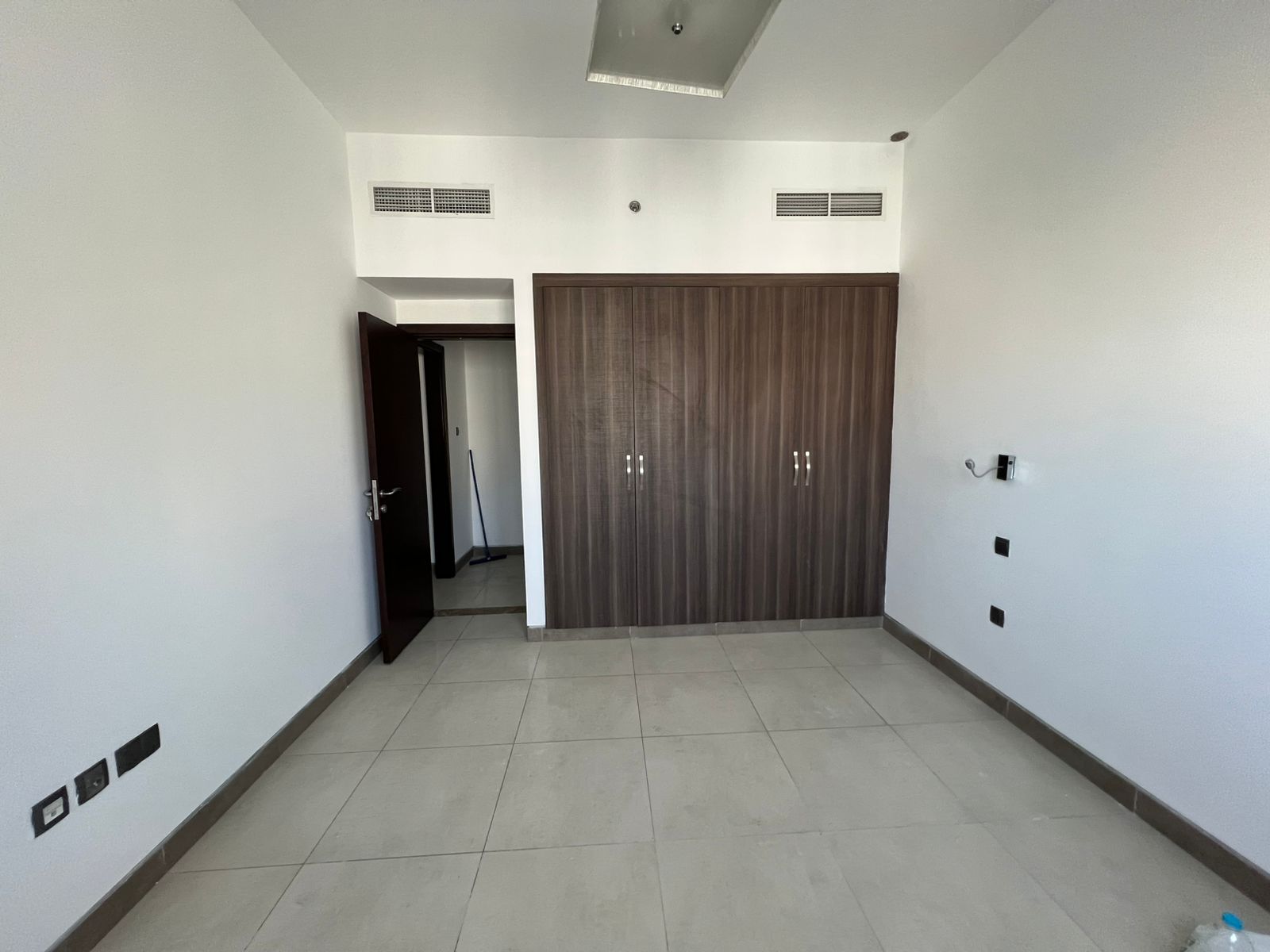 Second tenant 1BR in Sharjah, near Al Jubail Bus Station, free parking, gym & pool, super deluxe finishing, prime central location.