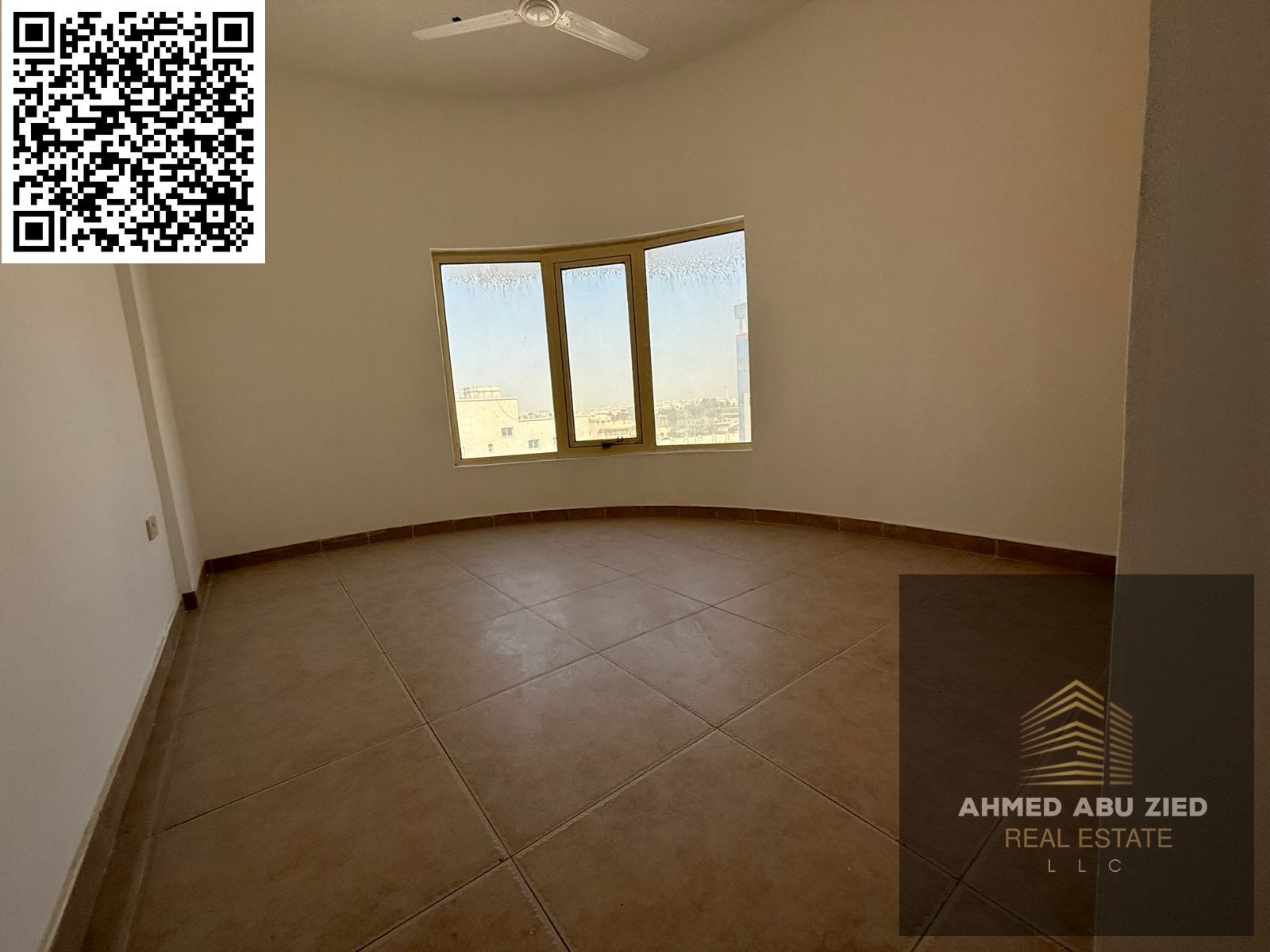 Spacious 2BR apartment for annual rent in Al Rawda 2, 2 master bedrooms, 3 baths, balcony, built-in wardrobes, split AC, free parking, AED 41K, 4 paym
