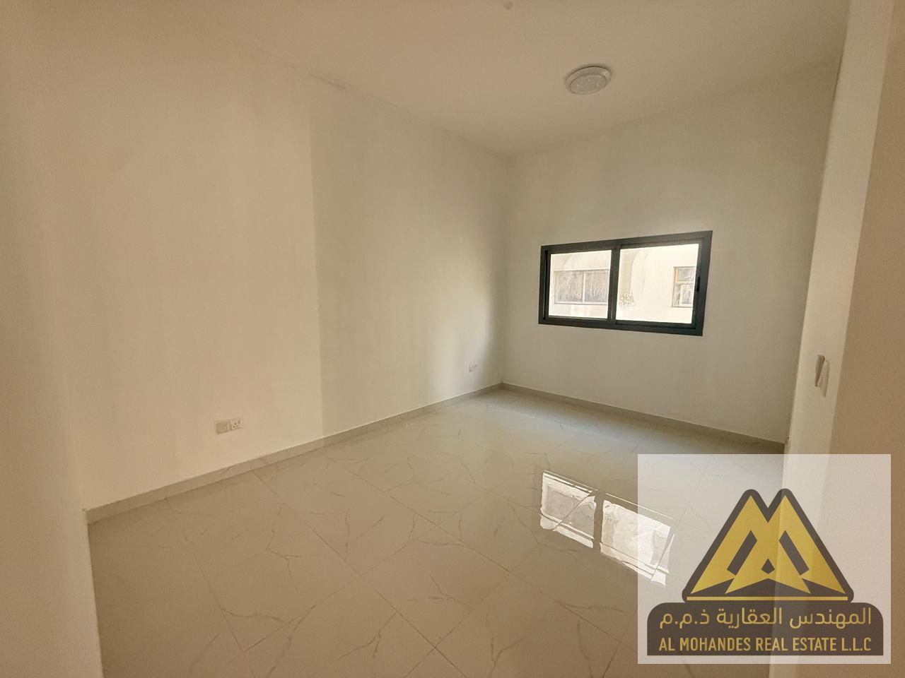 Spacious One-Bedroom Apartment for Rent in Al Jurf 3 Second Tenant 2 Bathrooms Master Bedroom Separate Living Room Central AC Excellent Finishing