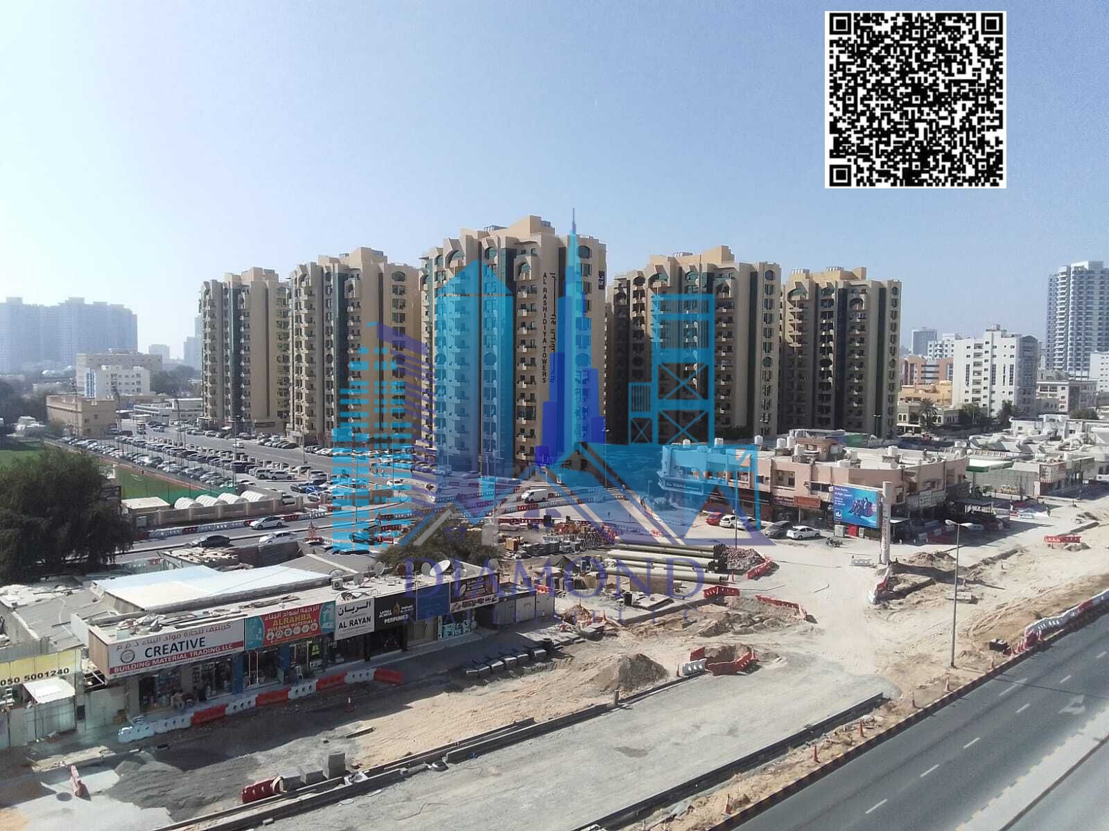 For sale a vacant apartment with two bedrooms and a large living room, with an open view of the Emirate of Ajman, in the Horizon Towers, Ajman.