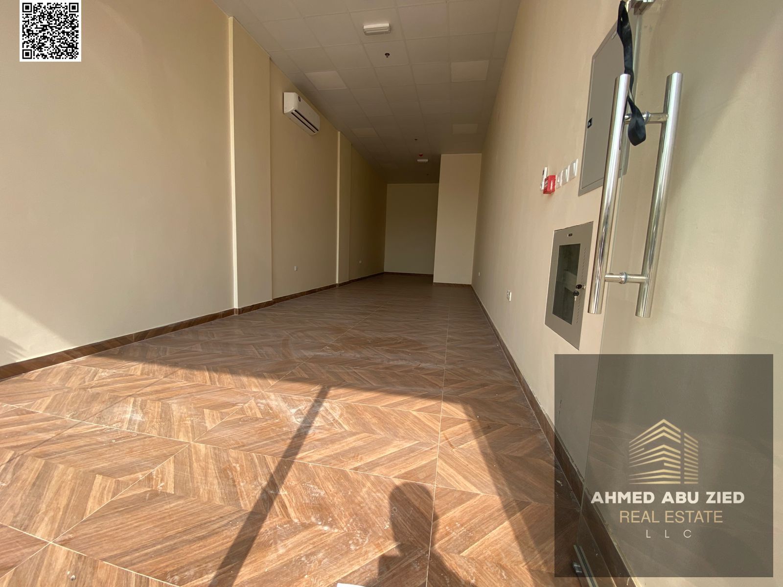 A prime commercial space of 988 sq ft, suitable for all types of businesses. Flexible payment options available. Includes a private bathroom. Full mai