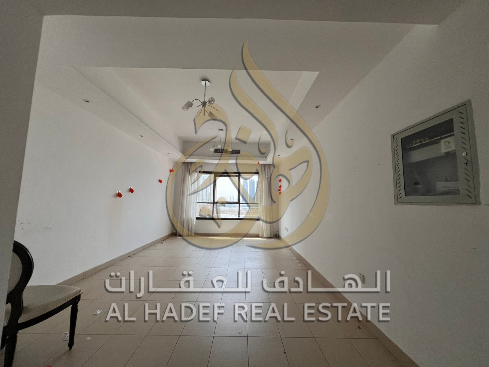 Available for rent in Al Qasba - One bedroom and living room + 2 bathrooms + 2 balconies + free air conditioning + free parking + free swimming pool a