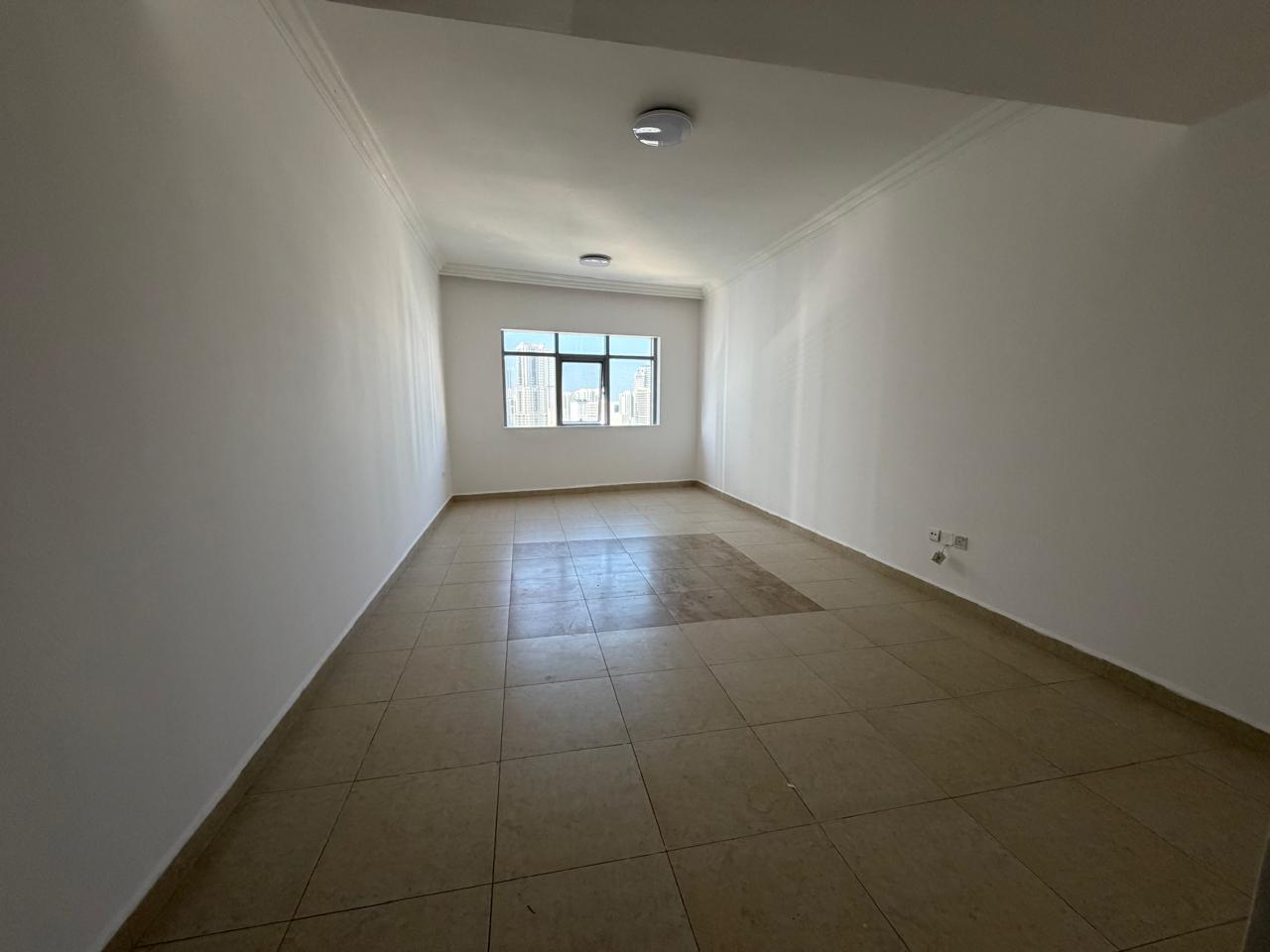 Stunning View | Largest 1BHK | Balcony with View | Free Parking | Central AC | Prime Location Near Dubai Exit