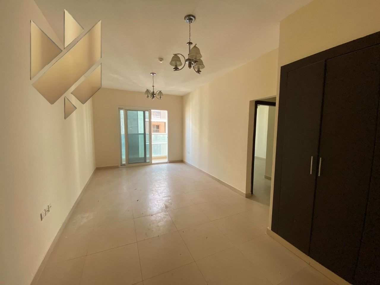 Two-bedroom apartment with a living room for annual rent in Muwailih Al Jadeeda. Spacious and with excellent finishes.