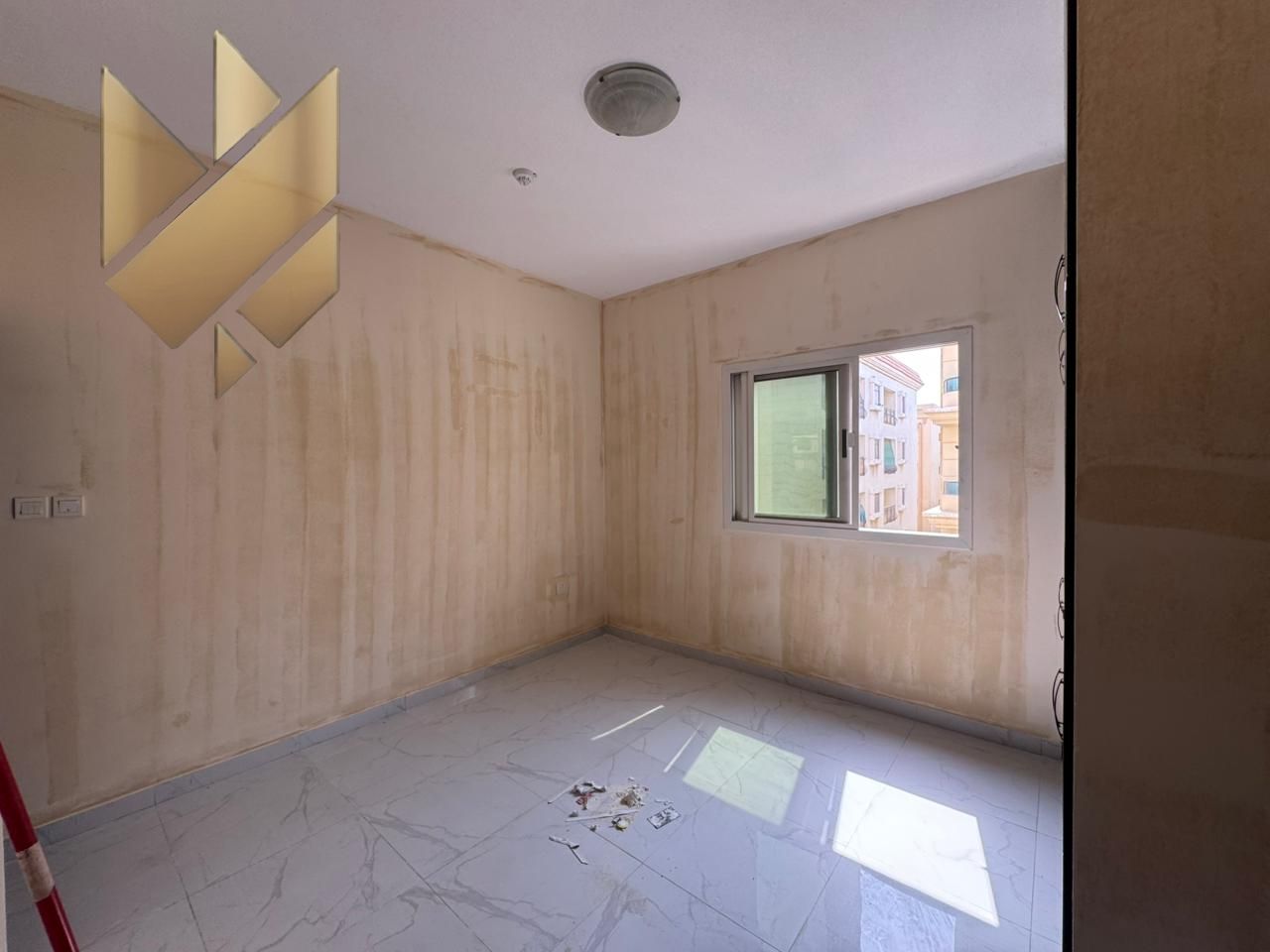 One bedroom and living room for annual rent in New Muwailih, excellent finishing, great spaces and a wonderful view
