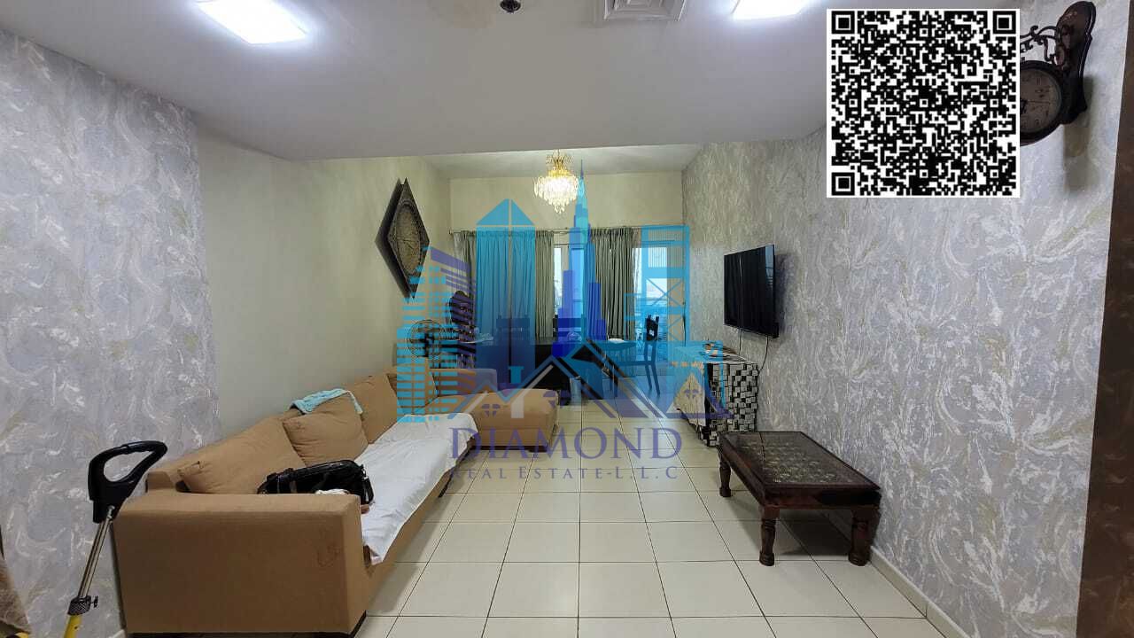 For sale: Two-bedroom apartment with a living room, fully furnished and equipped, with an open view, in Ajman One Towers, Ajman Emirate.