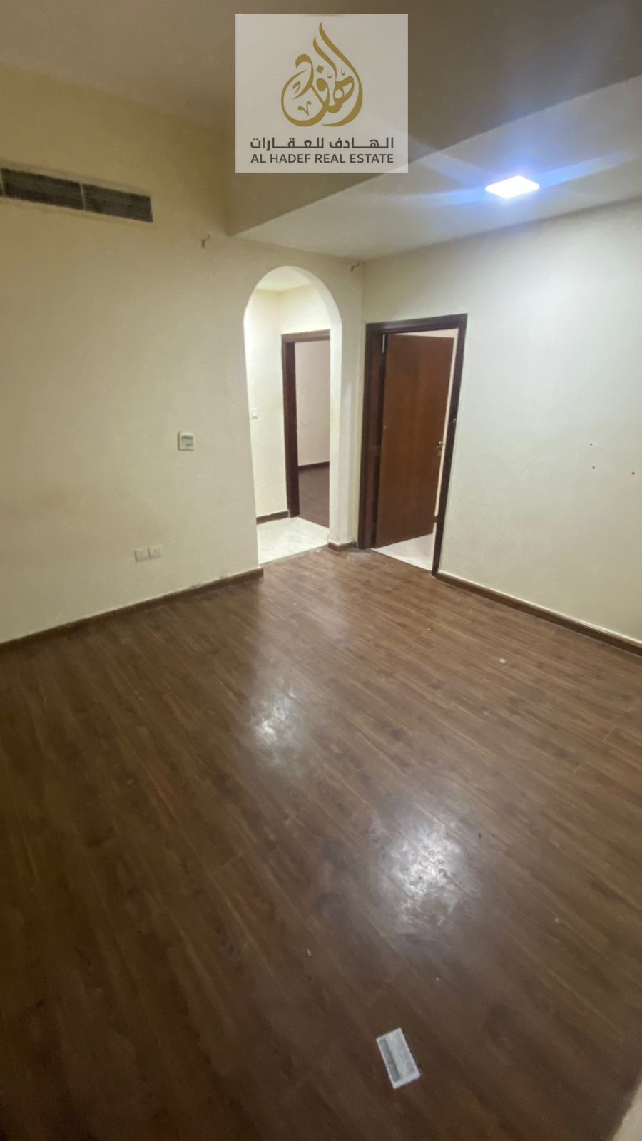 Annual rent in Ajman, Al Rawda 2 area, Sheikh Ammar Street, near Shurooq Mall. The building is for families and includes a bedroom and living room, ce