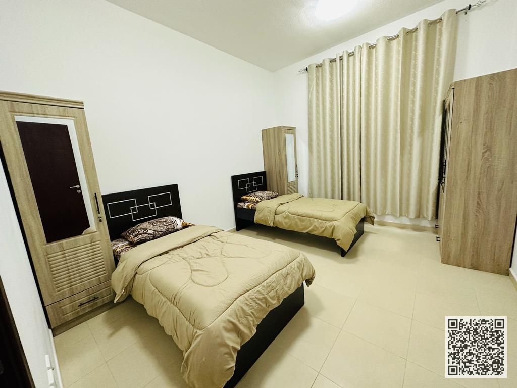 Luxurious and elegant two-bedroom apartment with a living room, fully furnished with brand new, high-end furniture, including all bills, internet, and