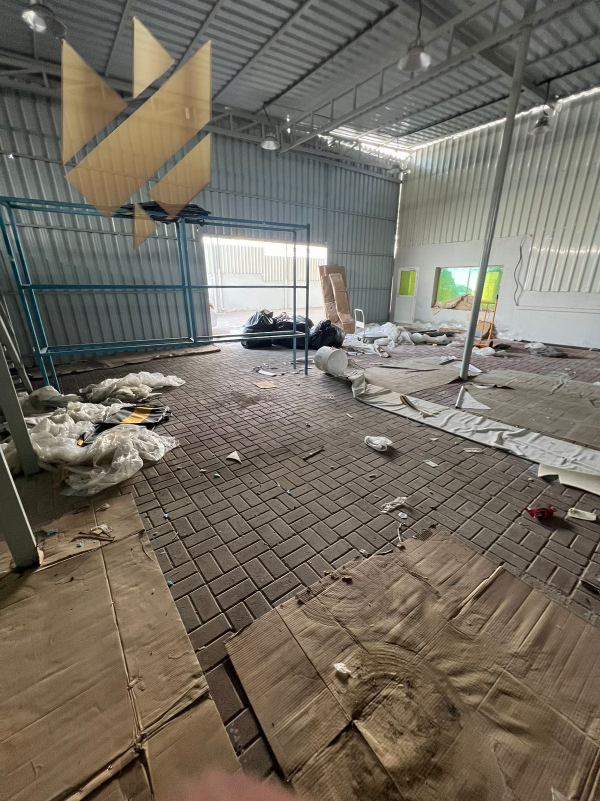 Industrial yard for rent in Industrial Area 4, 20,000 sq. ft, divided into workshops, offices, storage, and workers accommodation, suitable for automot