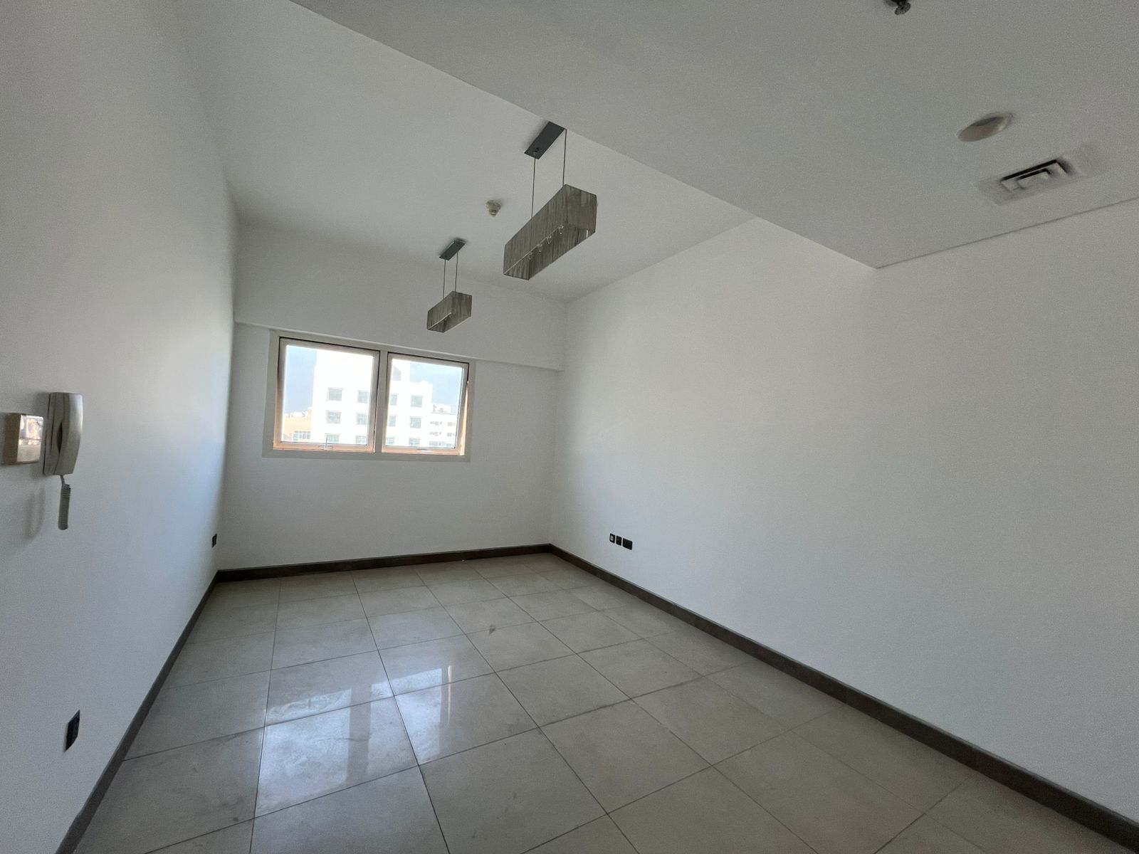 Second-tenant one-bedroom apartment and living room in Al Soor area – free parking – free gym + swimming pool – super deluxe finishing –