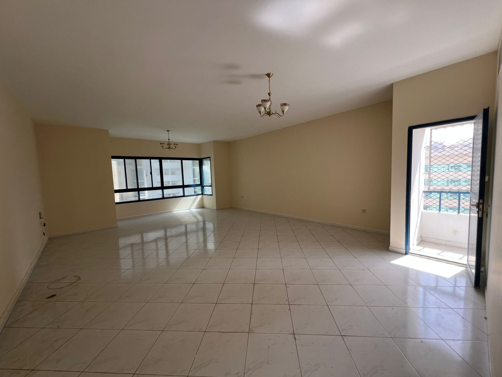 Largest 3BR in Sharjah with central AC & balcony, prime location second row from Al Majaz Waterfront.