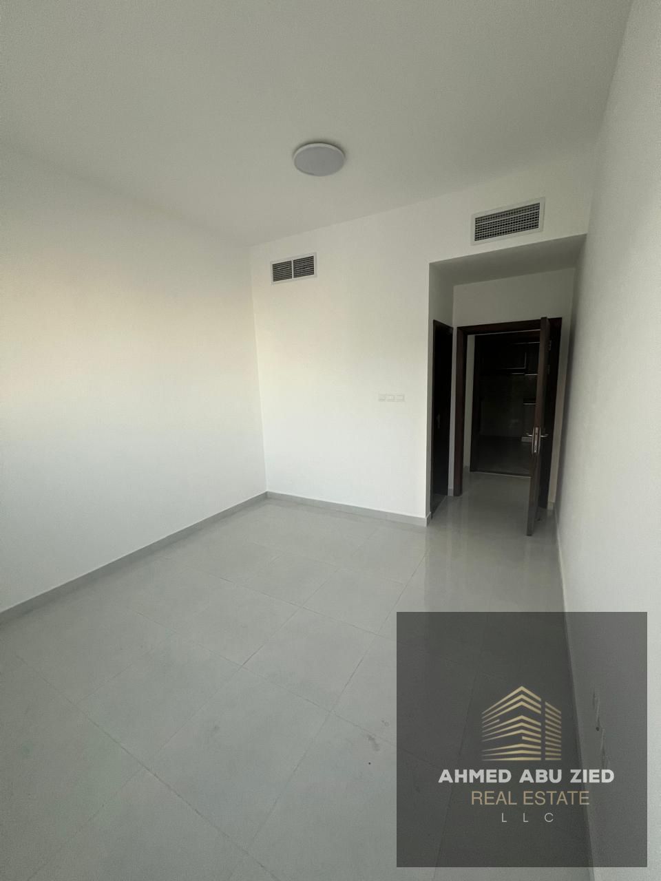 One Bedroom + Living Room for Annual Rent in **Al Jurf 2** – 2 Baths, Balcony, First Tenant, Near Schools, Main Street