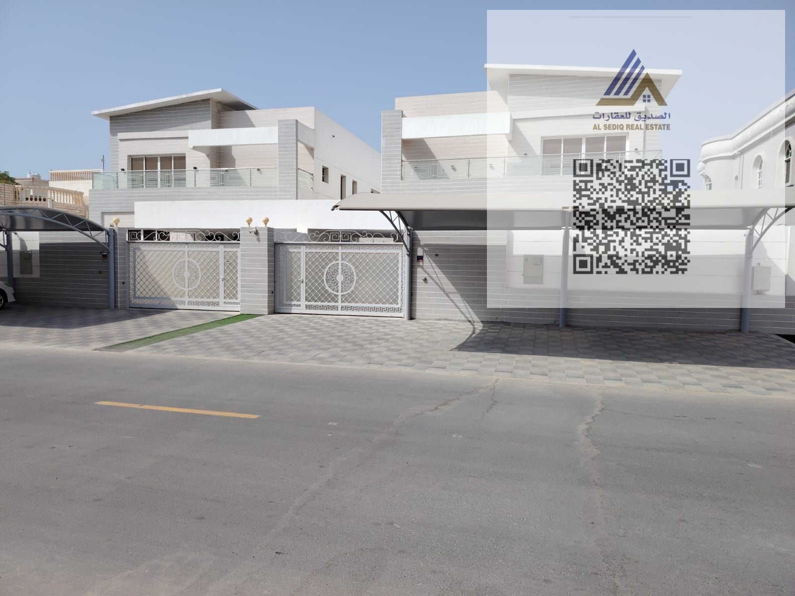 Villa for sale in Ajman, Al Rawda area, with electricity, water, and air conditioning included.