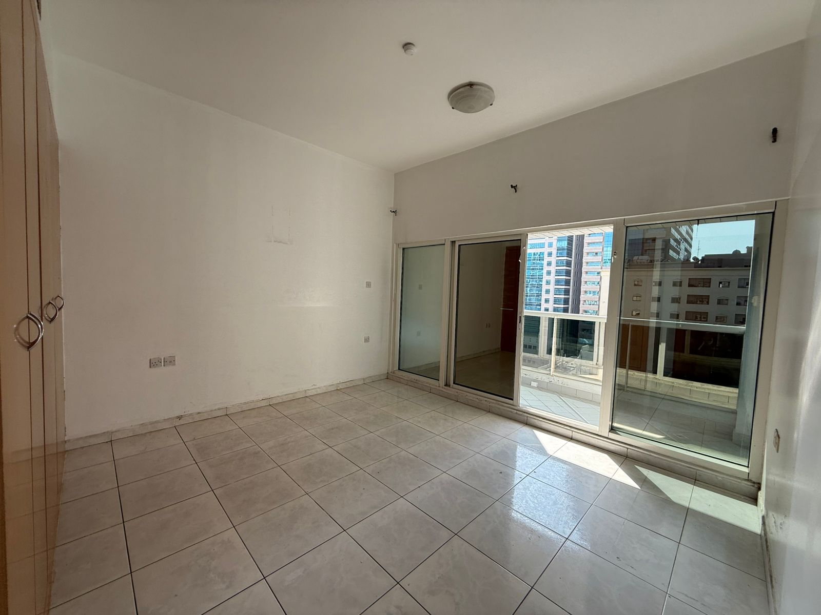Free AC – 2 Bedrooms + Hall – Balcony with Open View – Family Tower – Built-in Wardrobes – Spacious Kitchen – 2 Bathrooms – 4 Payments – Near Dubai Ex
