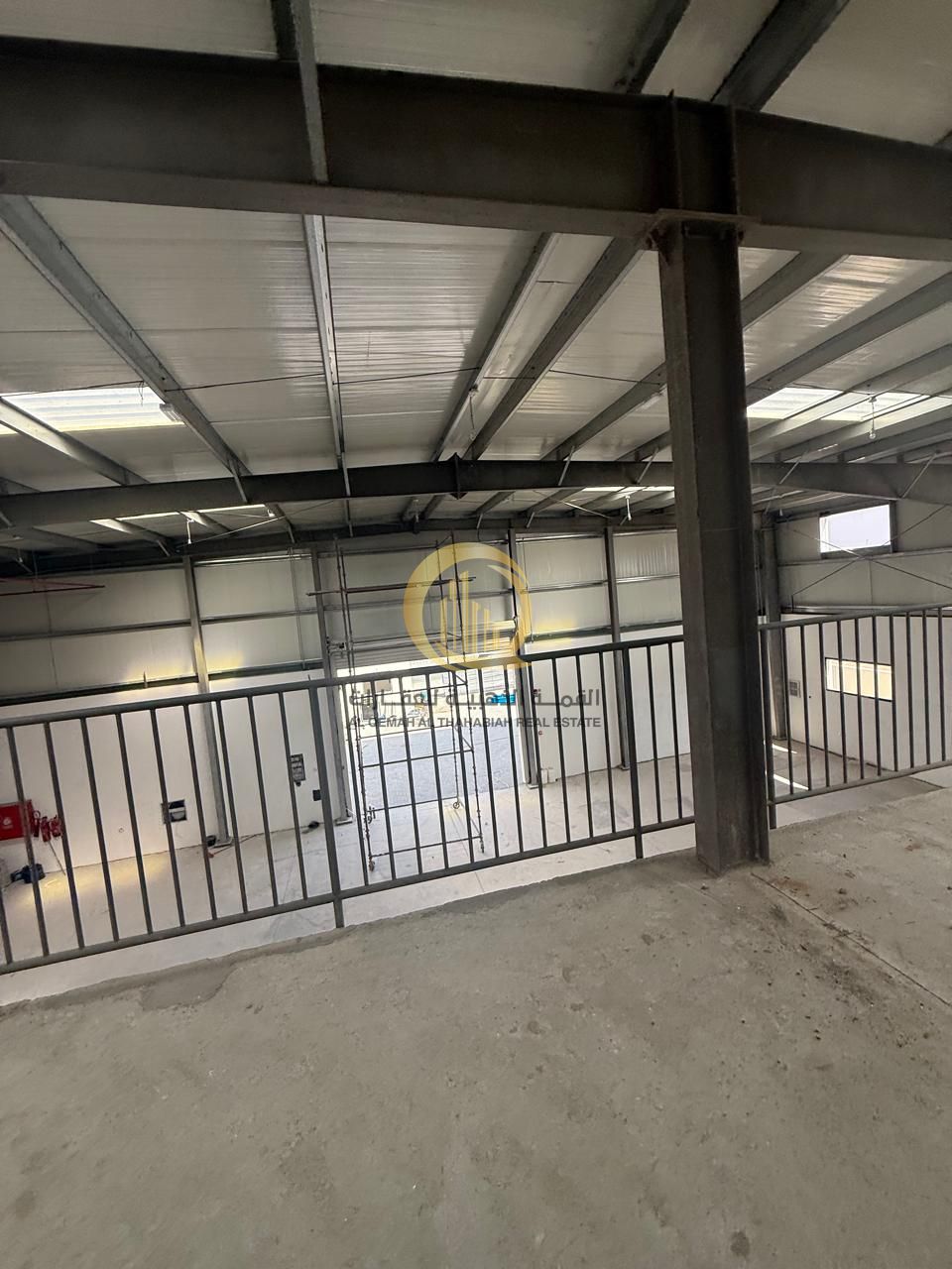 Warehouse for sale in Al-Jalil Al-Industrial Al-Sharjah. Land area: 14,500 sq ft Building area: 11,260 sq ft, ground floor and mezzanine, with a f