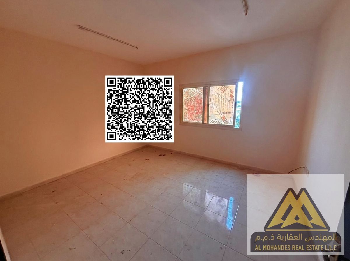 Spacious family apartment with central AC and balcony, prime location near a school.