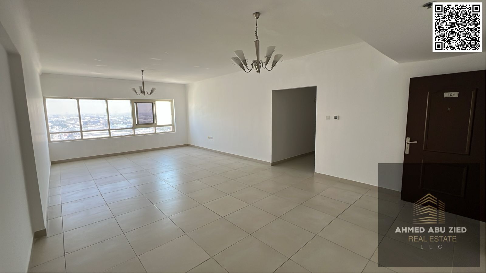 Two bedrooms, a large living room, a spacious kitchen, two bathrooms, a balcony with an open view, built-in wardrobes, flexible payment options, close