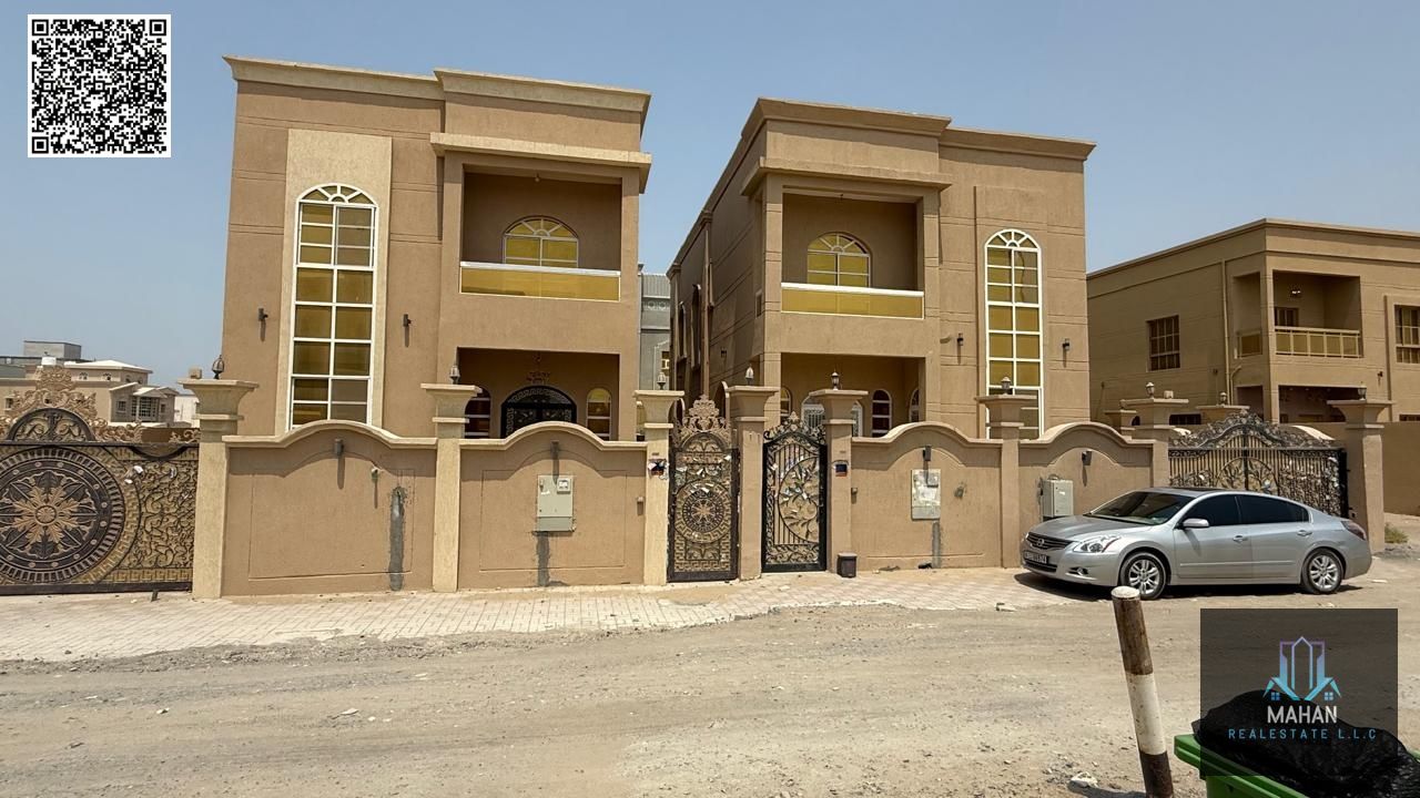 Modern villa for sale in Ajman, including electricity, water, and air conditioning, facing a children's park.