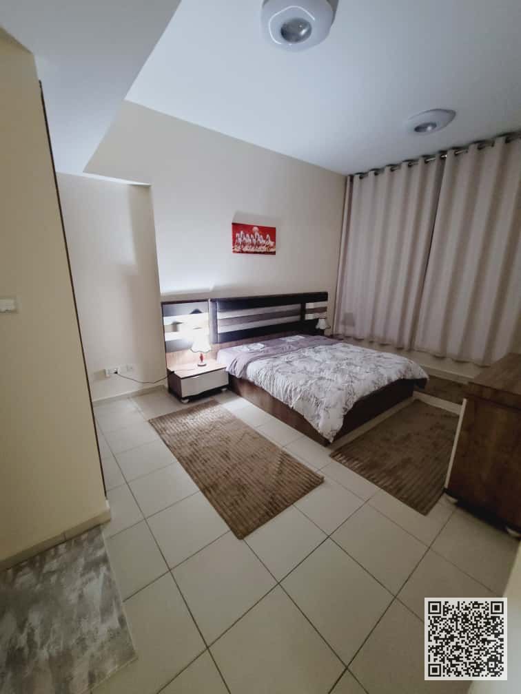 Fully furnished one-bedroom apartment with elegant and tidy furnishings for monthly rent - Al Rashidiya 1 - Ajman One Towers - All bills included