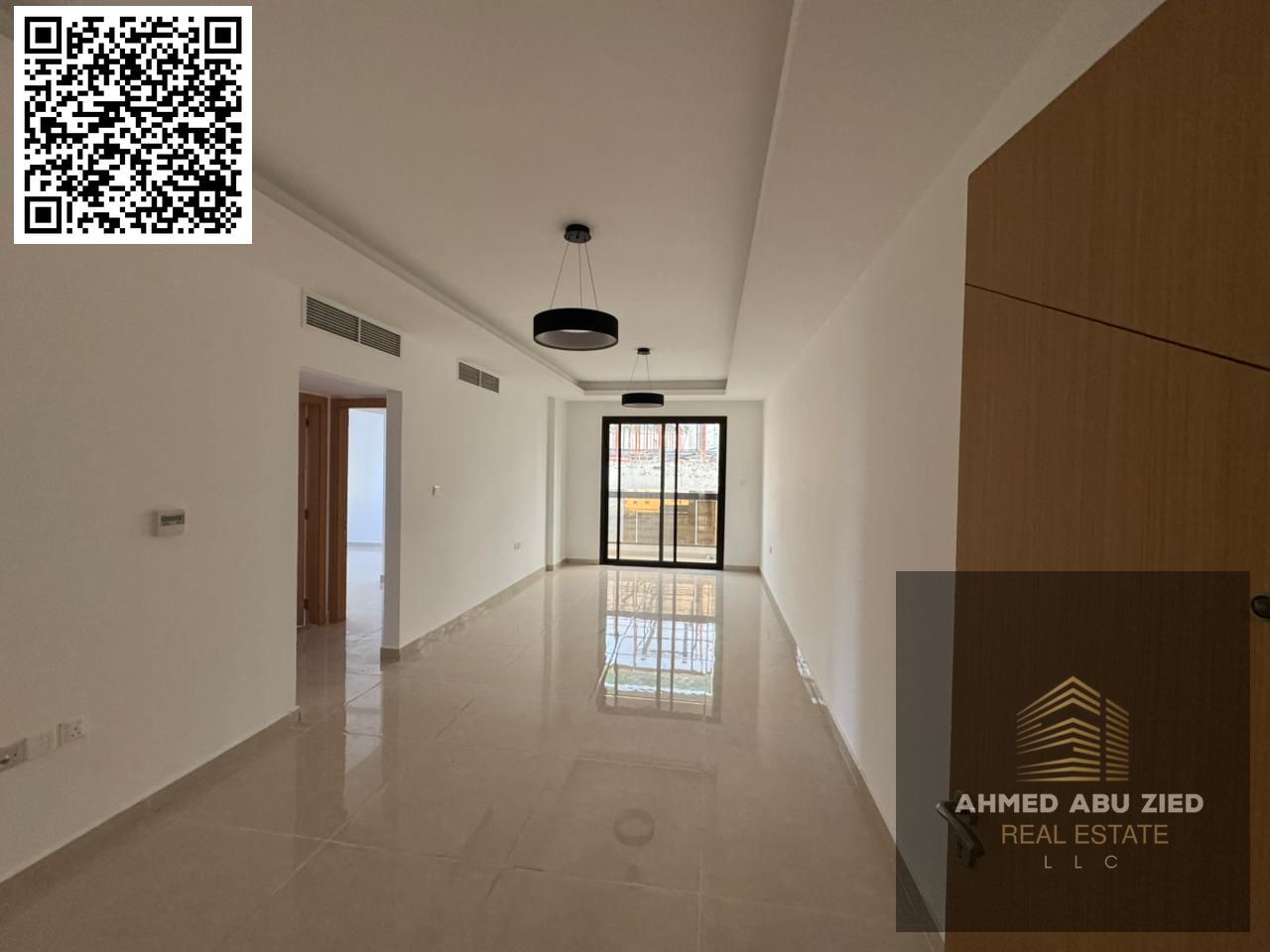 Two bedrooms and a living room, brand new for annual rent in Al Jurf 3, Ajman. Features include a balcony, three bathrooms, modern finishing, spacious