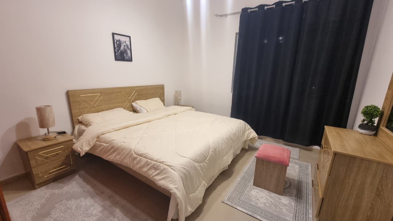 Furnished one-bedroom apartment, first tenant, in Al Khan 3. Brand-new finish and elegant furniture, prime location near services, monthly rent with f