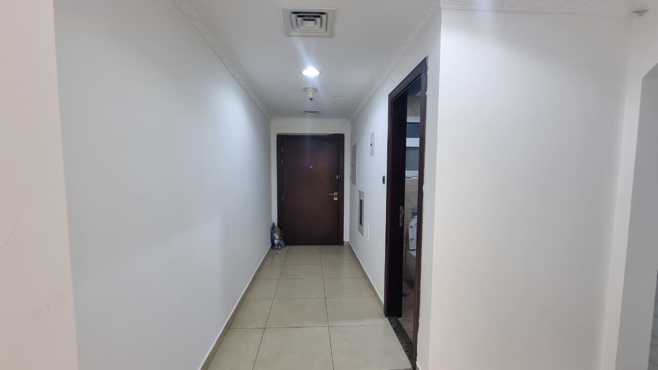 2BHK in Al Khan with 2 master rooms + maid’s room, balcony, built-in wardrobes. Free parking, gym & pool. 4 cheques.