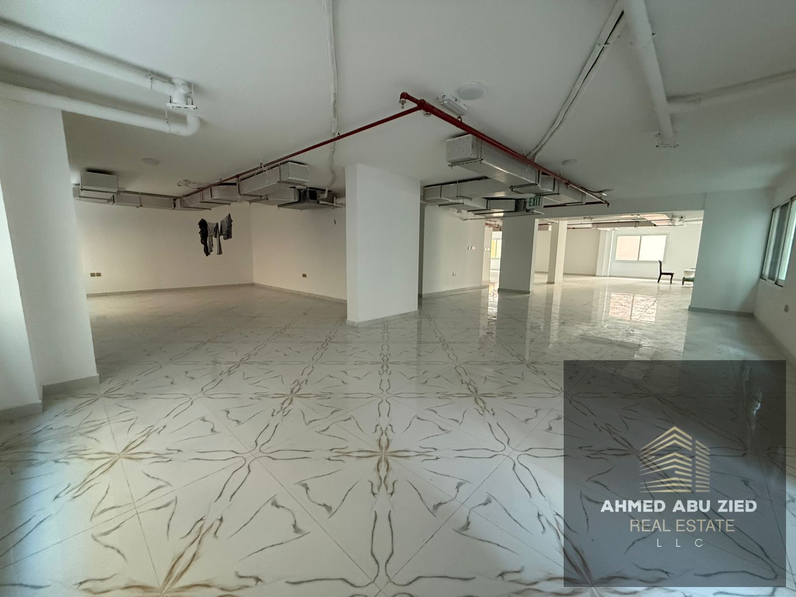Largest office or full commercial floor for annual rent in Ajman, brand new building (first tenant), 1 month free, prime location with easy access to