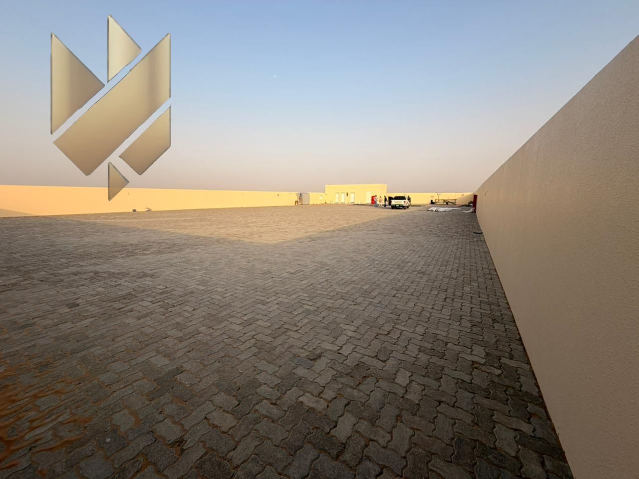 For Annual Rent | Prime Land in Al Sajaa Directly on a main road Total Area: 20,000 sq. ft. Electricity available – 25 kW