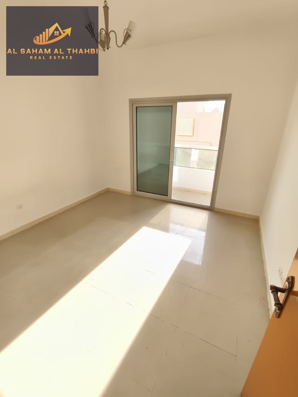 Two-Bedroom Apartment with Balcony for Rent in Al Taawun Area