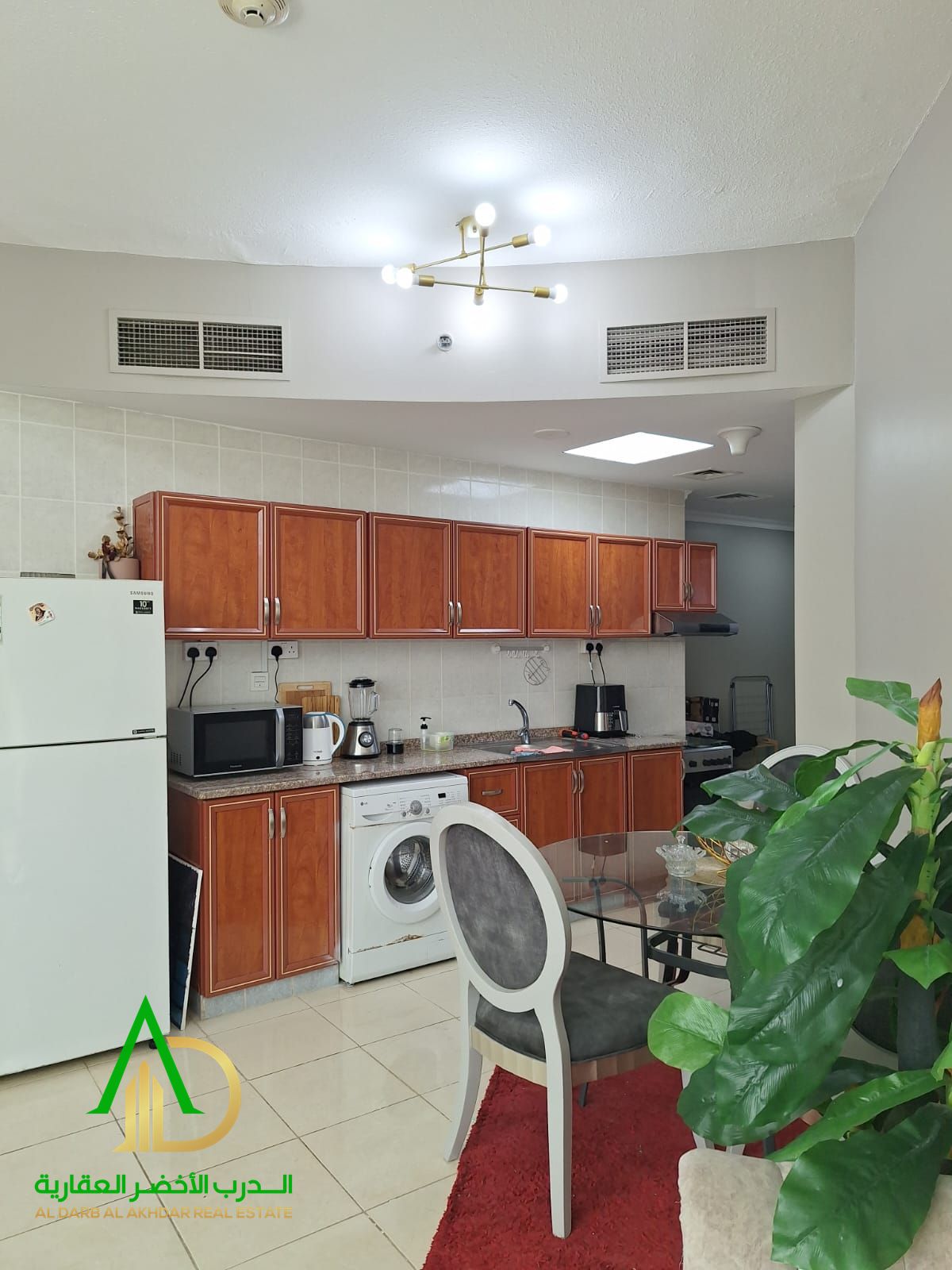 Furnished one-bedroom apartment with a living room available for monthly rent, offering a spacious layout in Al Bustan with Liwara, near Ajman Cornich