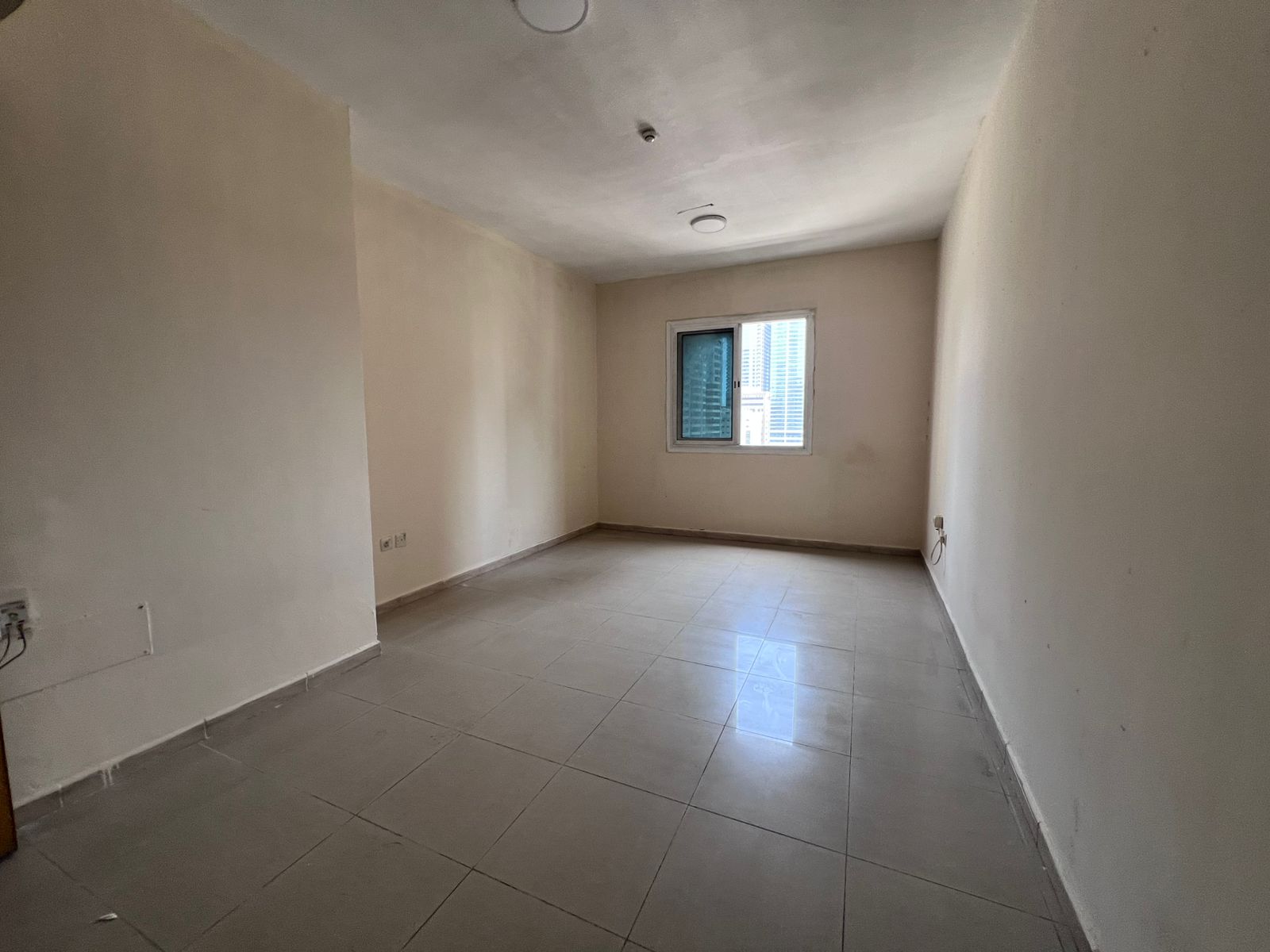 The most beautiful 1-bedroom apartment with a large living room and open view, with central air conditioning in Al Khan.