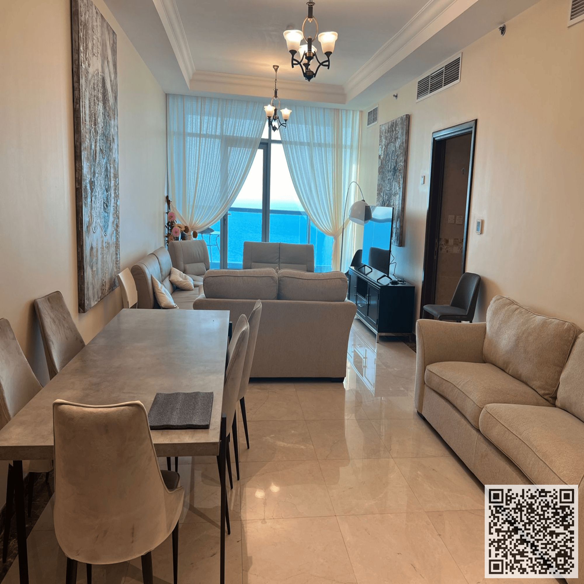With a direct sea view, a fully furnished 3-bedroom duplex apartment with a living room for monthly rent in Ajman Corniche Residence with a gym, pool