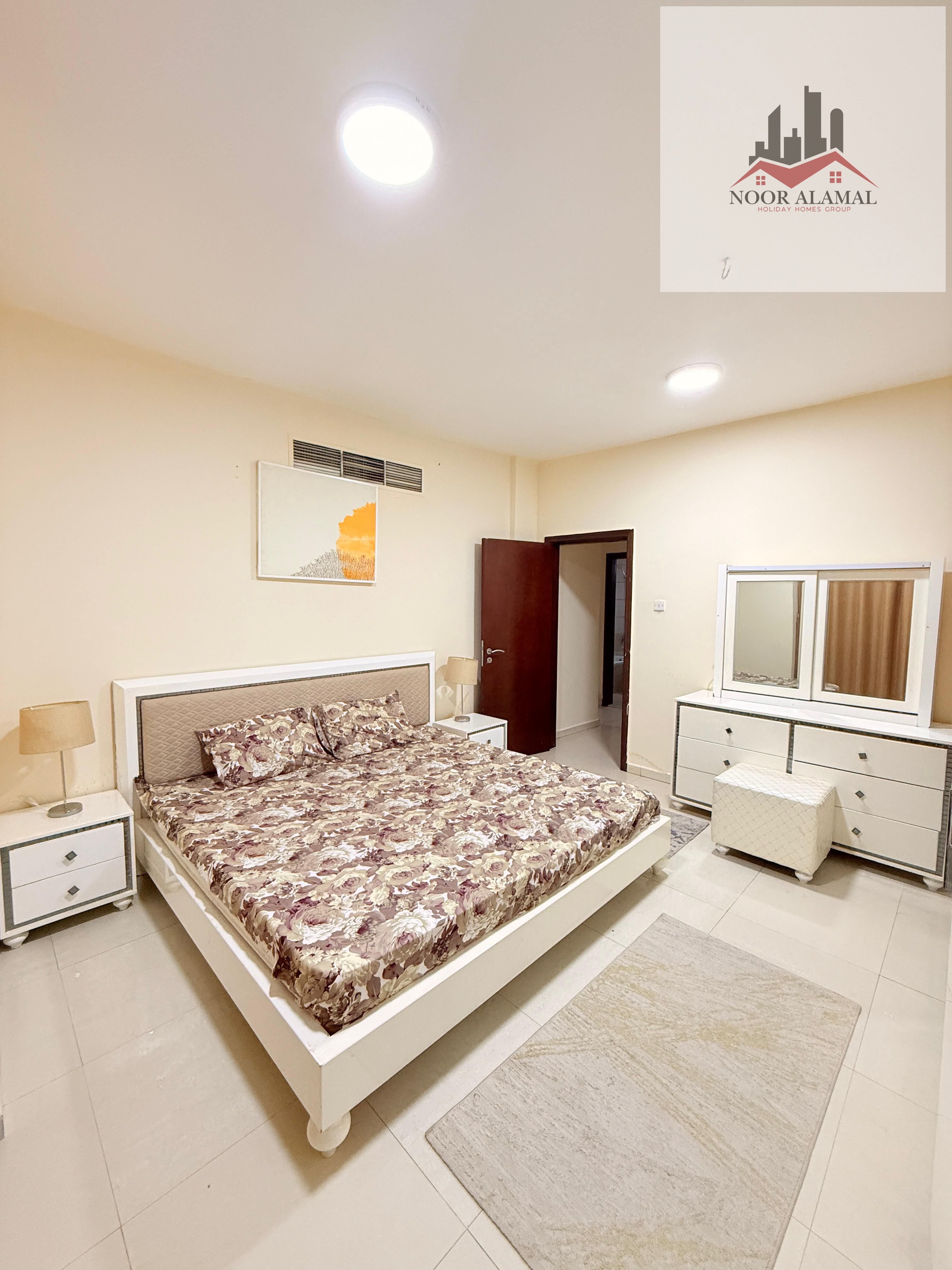 Sharjah, Al Majaz 3, fully furnished super deluxe apartment, second tenant, one bedroom, living room, kitchen, bathroom, and balcony.