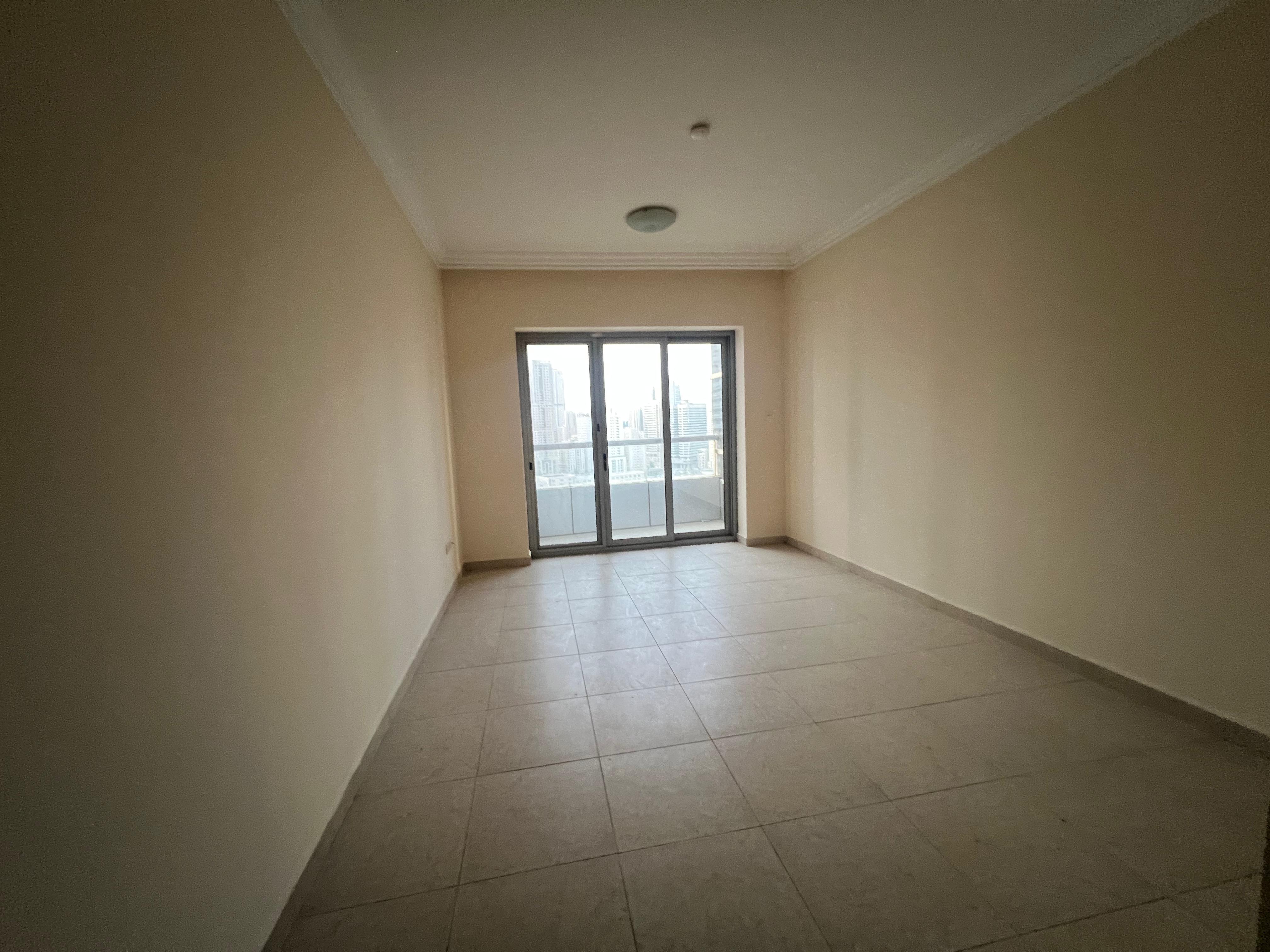 “The largest and most luxurious one-bedroom apartment with living room in Sharjah, free parking, large balcony with open view, and 2 bathrooms. ”
