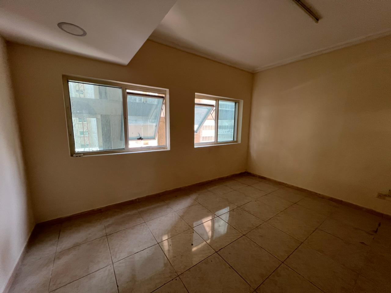 1 Bedroom + Living Room in Al Qasimia | Central AC | Family Building | Free Maintenance | Prime Location | Close to All Services