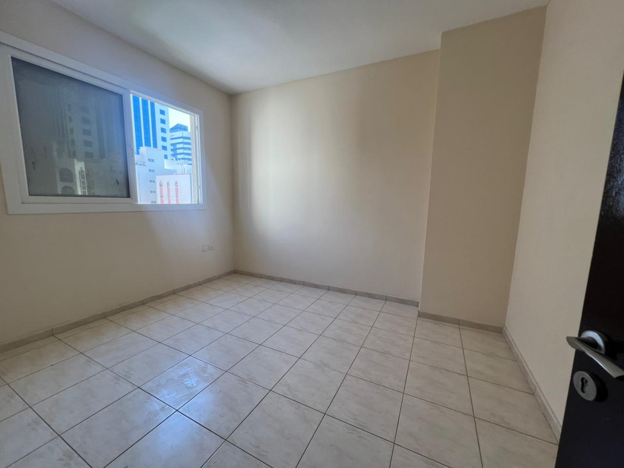 Two-bedroom apartment with a living room in Al Majra for annual rent, flexible payment in 4 or 6 installments, great location, excellent finishing, id