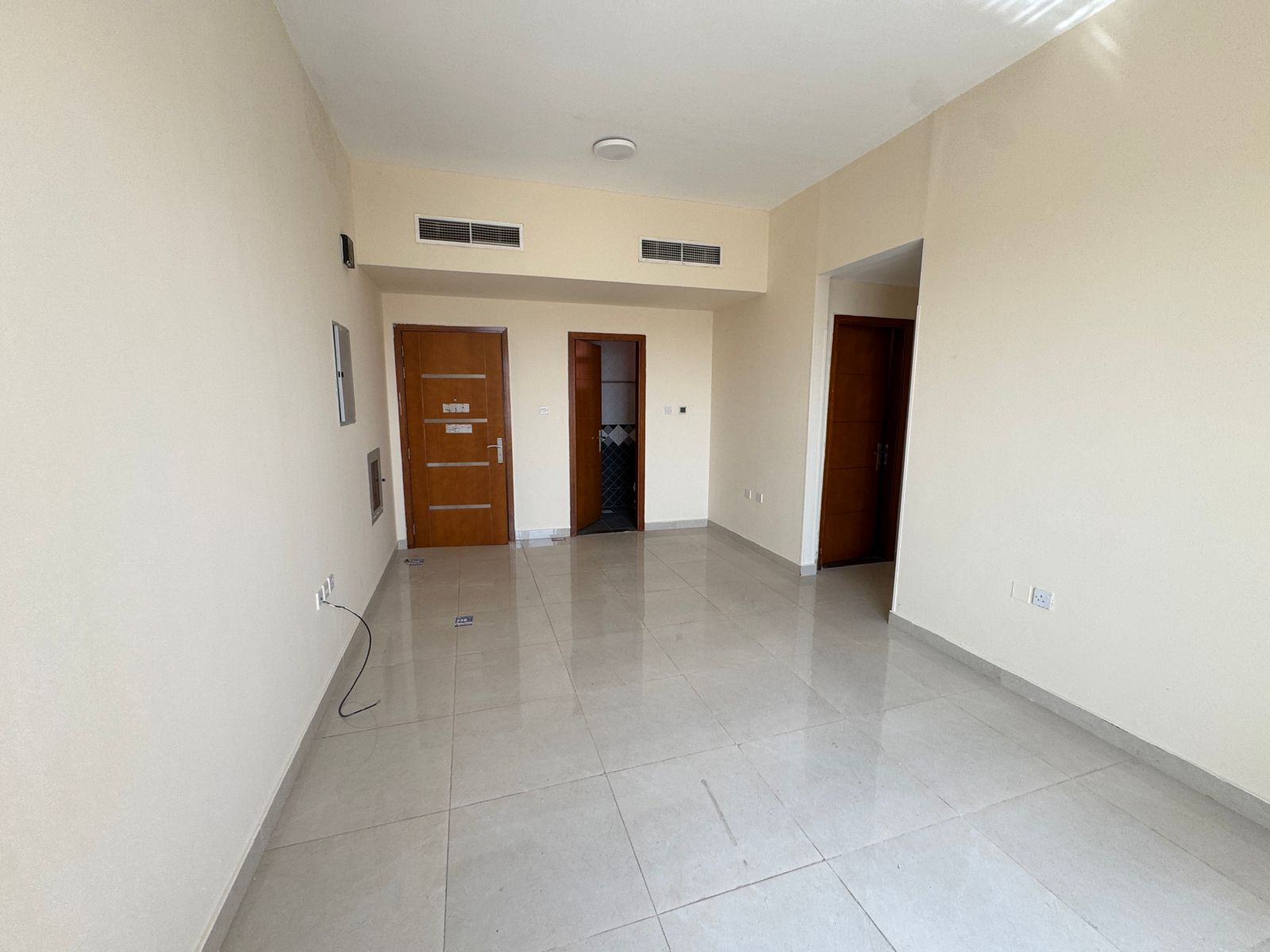 For annual rent in Al Rawda, Ajman: apartments at the lowest prices, two-bedroom apartment with a living room and parking.
