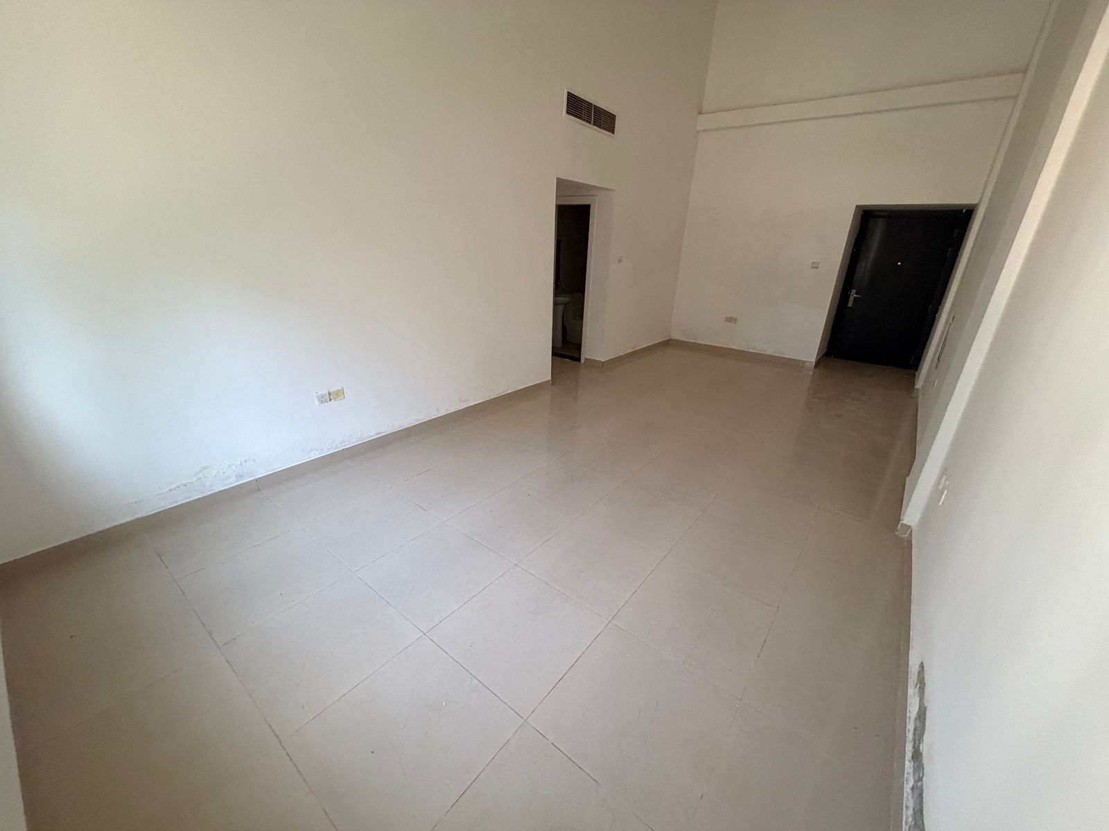 Apartment for annual rent in Ajman, two bedrooms and a living room, ground floor, in Al Muwaihat 3 area