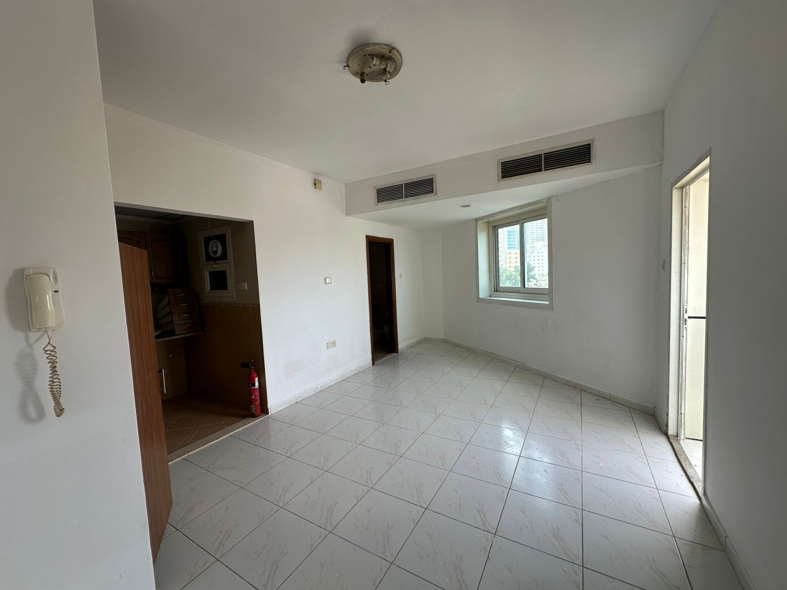 For annual rent in Ajman – a distinctive studio with a balcony and separate kitchen in Al Rashidiya 3 area