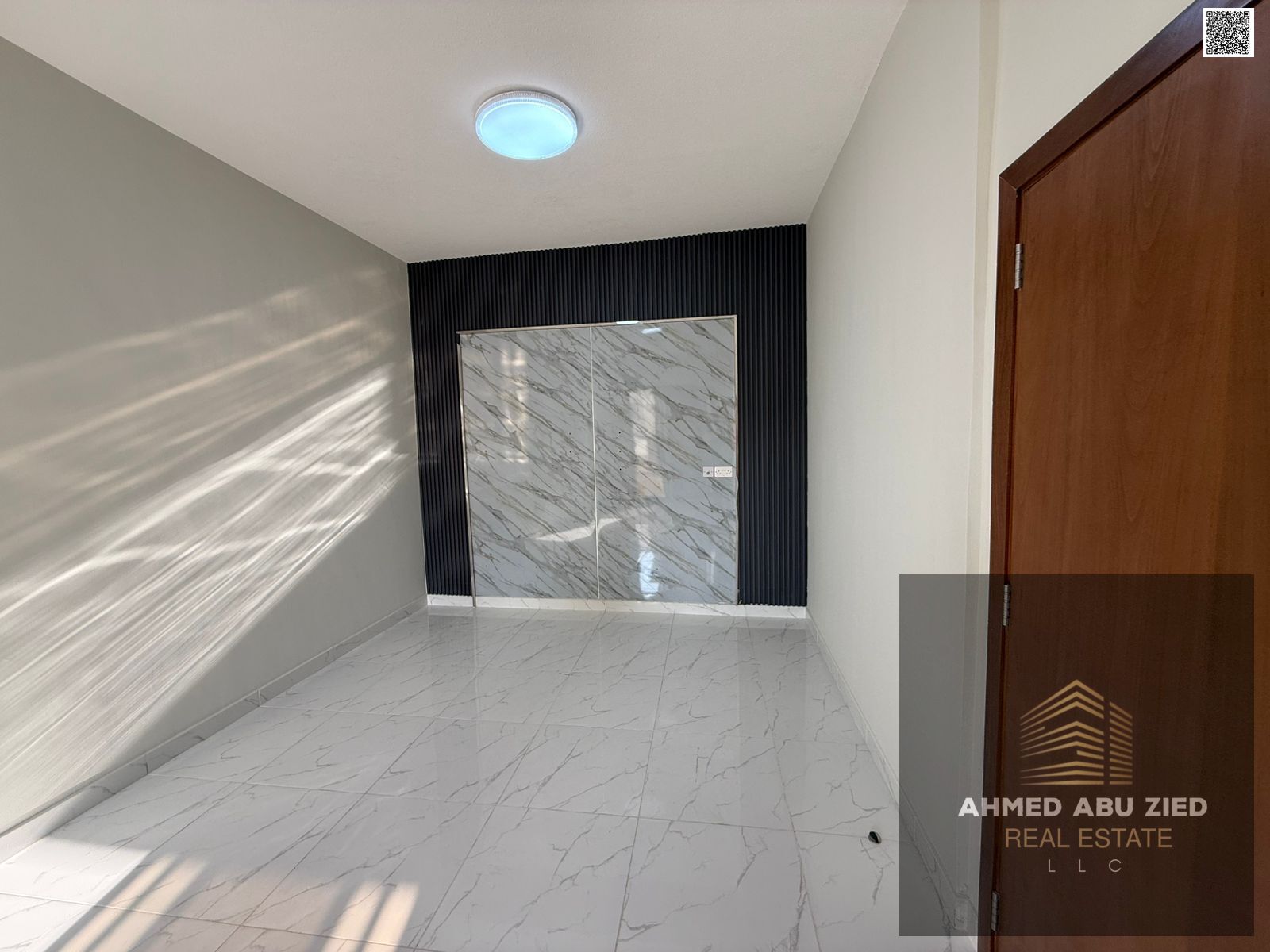 1BR apartment for rent, 2 bathrooms, master with wardrobes, large living room, balcony with open view, central AC, prime location near Sheikh Khalifa