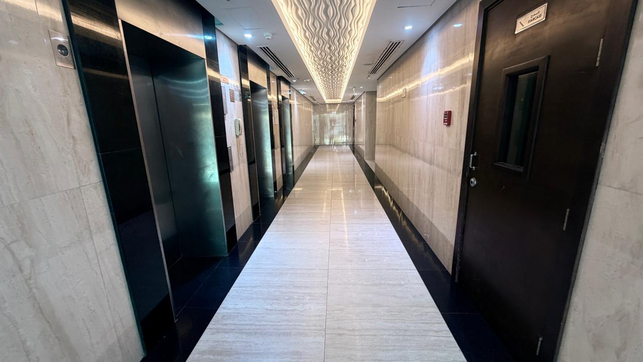 One-bedroom apartment with a stunning sea view and spacious living area in a prime location on Ajman Corniche, at a competitive price.