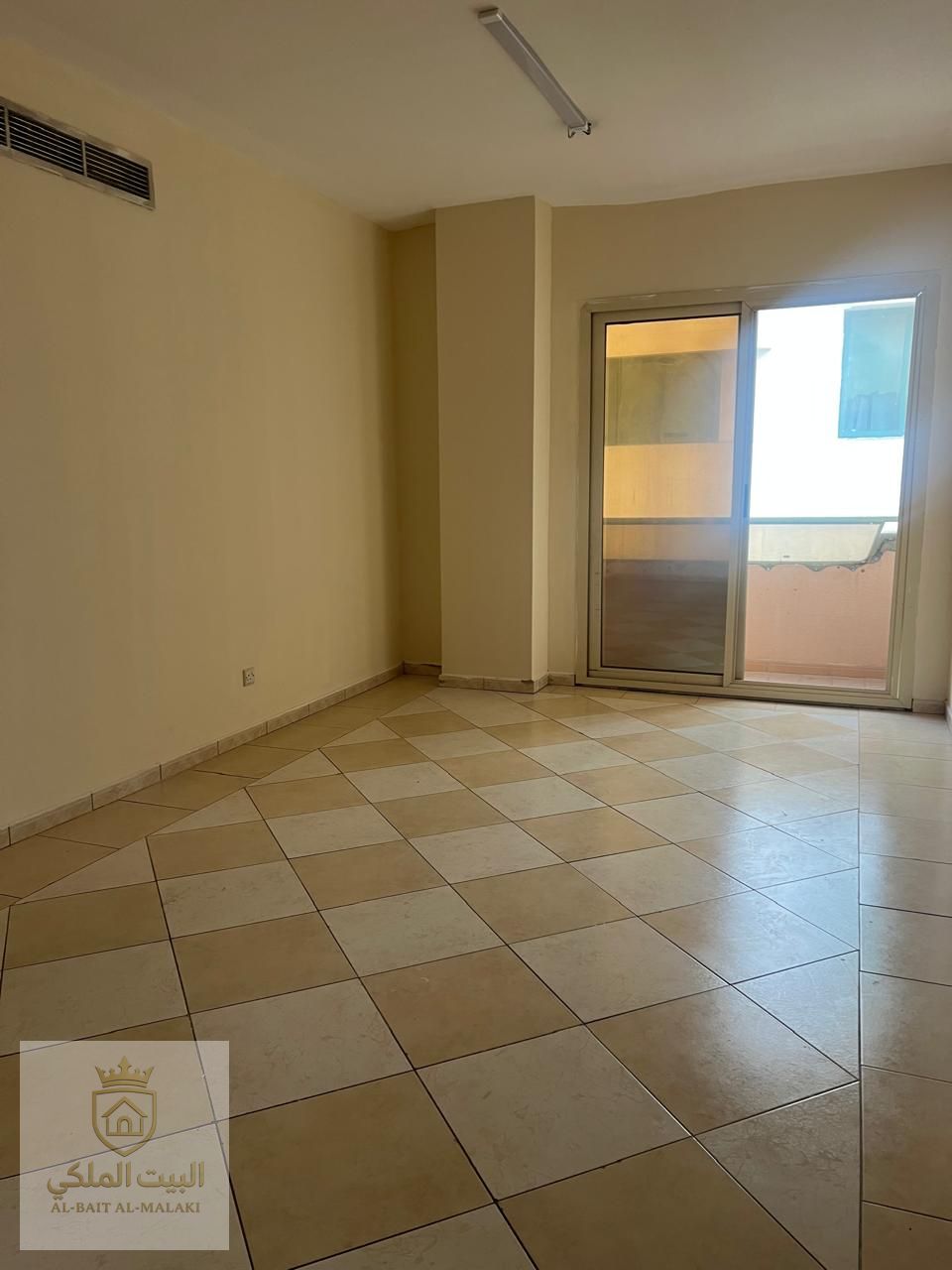 One-bedroom apartment in Al Qasimia - Al Nud area with a spacious living area