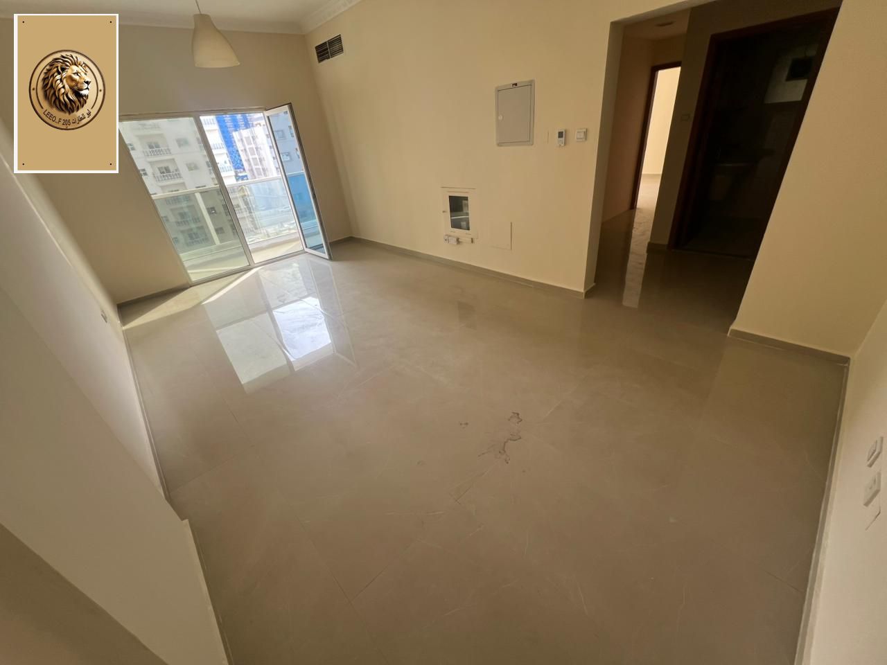 For annual rent in Ajman - Al Rashidiya 3 A distinctive one-bedroom apartment with a spacious living room in a prime location opposite Grand Mall Ajma