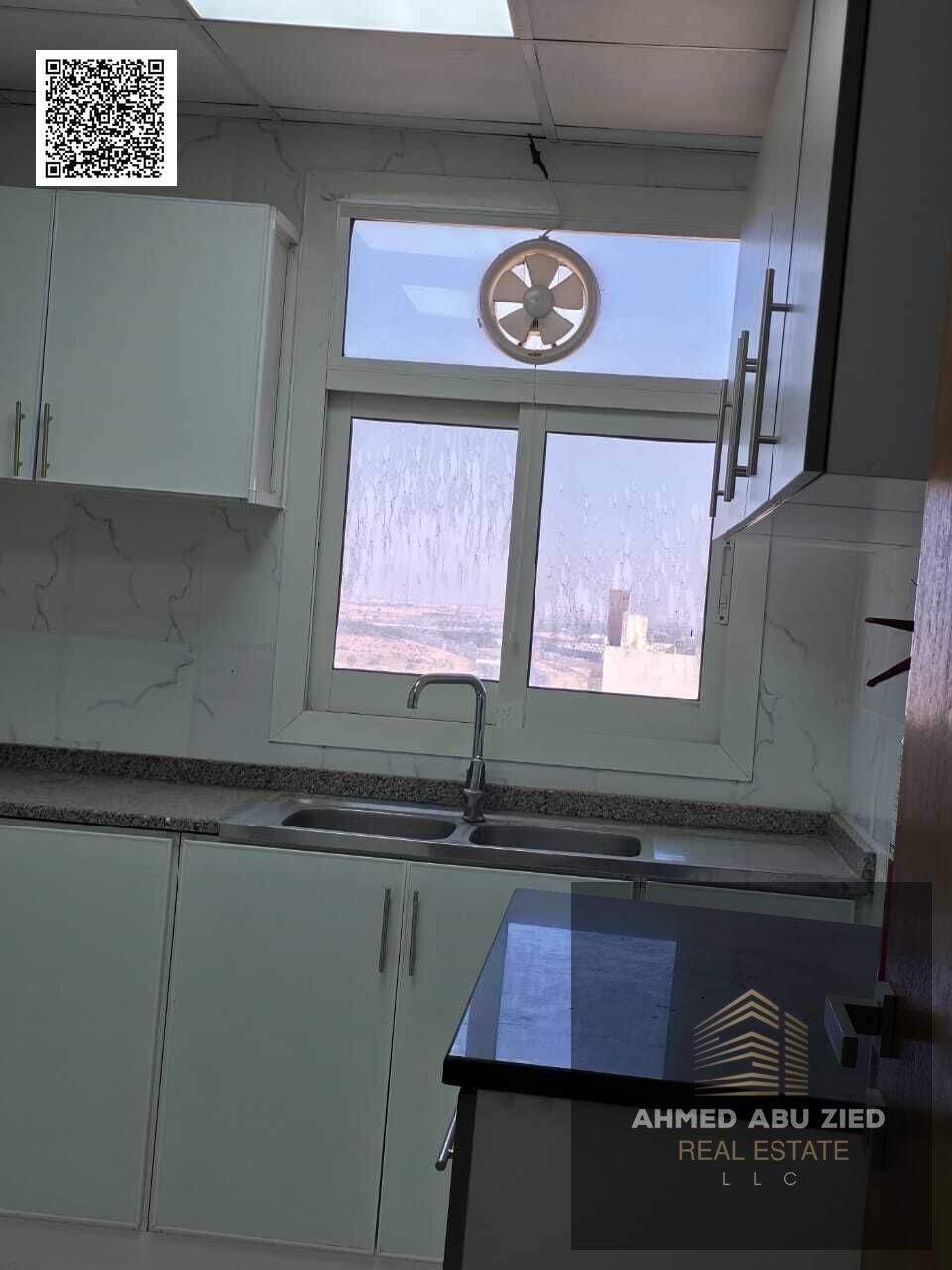 For annual rent in Emirates City – Master bedroom and living room at studio price | Open view + balcony | New tower near Mohammed Bin Zayed exit | 2 b