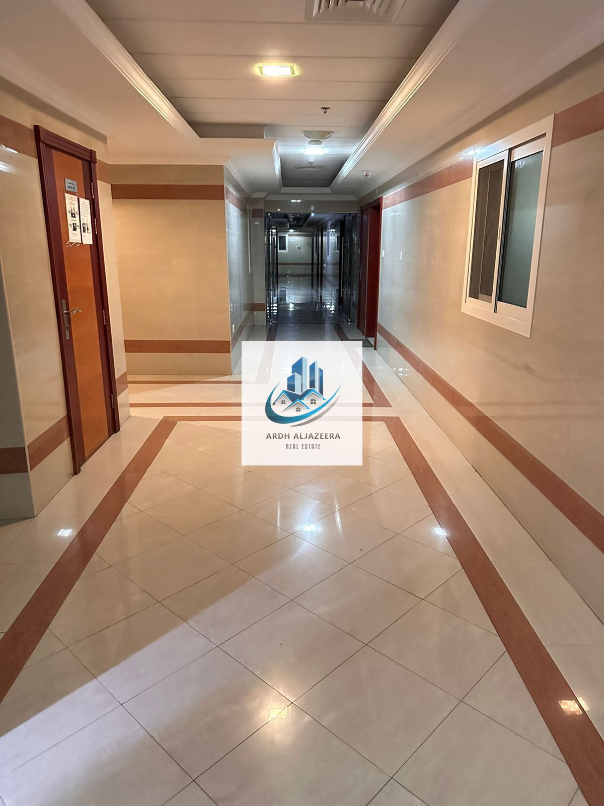 Premium class 1bhk in Fully Family building Near Sahara center Al nahda Sharjah 1Room with cupboard and close Hall premium kitchen with new woodish cabnots perfect for families