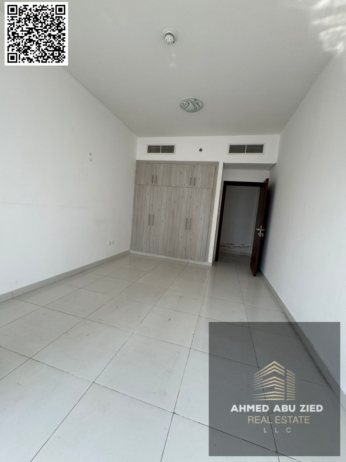 Largest and most elegant two-bedroom apartment with a living room | 2 bathrooms | Built-in wardrobes | 2 balconies with open views | Central air condi